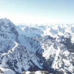 From the summit: Sherpa peak, Stuart, and on the right a frozen Stuart Lake