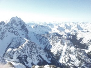 From the summit: Sherpa peak, Stuart, and on the right a frozen Stuart Lake